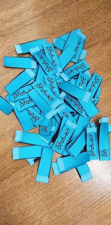 Другие услуги пошива одежды: Жаккардовые этикетки, и основа и логотип вышиваются нитями, главное — 11