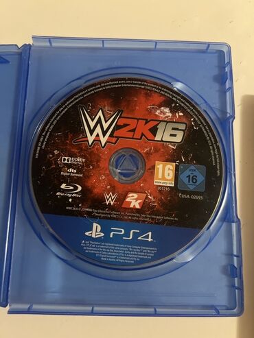 ps3 oyun disk: PlayStation 4 üçün WWE 2K16 və FIFA 16 oyunları. Hər iki oyun