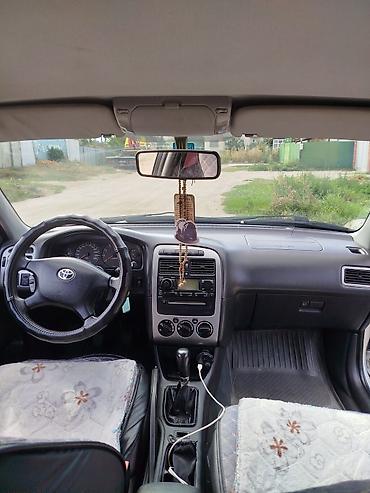 merc w210: Toyota Avensis: 2003 г., Бензин — 6