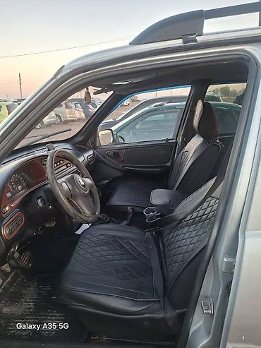 Chevrolet: Chevrolet Niva: 2003 г., 1.7 л, Механика, Бензин, Внедорожник — 9