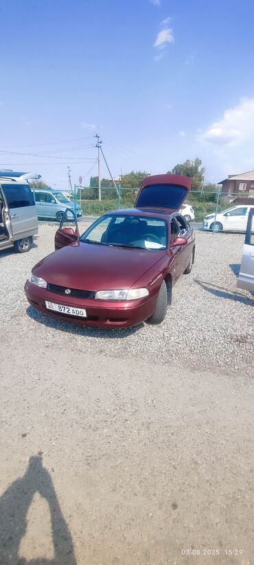 авто афтамат: Mazda : 1995 г., 2 л, Бензин, Хетчбек