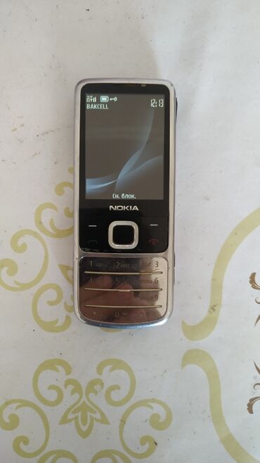 Nokia 6700 Slide, < 2 GB Memory Capacity, rəng - Gümüşü, Zəmanət, Düyməli
