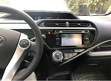 qadin masini: Toyota Prius: 1.5 l | 2015 il Hetçbek — 10