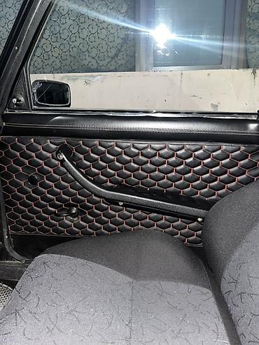 vaz 2110: Avtomobil qapı döşəməsi – qara eko–dəri, narıncı-sarı tikişli — 1