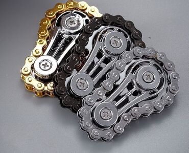 Игрушки: Небольшой спиннер из металла, выполненный в виде велосипедной цепи — 7