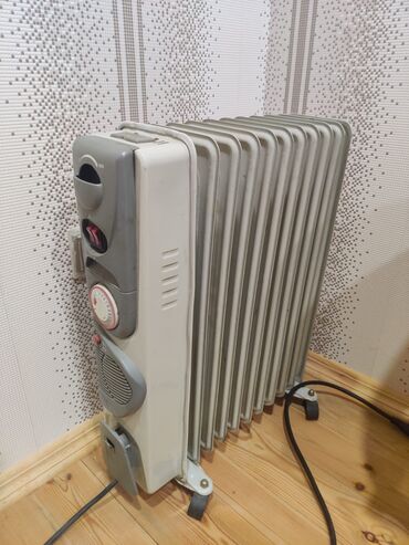 Elektrikli qızdırıcılar və radiatorlar: Radiator 11 seksiyalı. İşlək vəziyyətdə. Qiyməti 30 azn. Ünvan