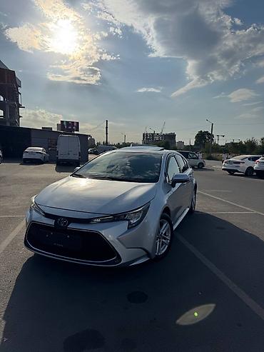 электромот: Toyota Corolla: 2021 г., Гибрид, Седан — 2