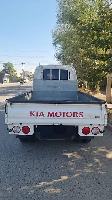 kia ev3: KIA Bongo (двухдверный бортовой малотоннажник) - Компоновка: кабина — 2