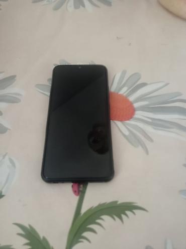 i7 4790k prosessor: Smartfon – qara rəngdə, böyük tamekranlı dizayn - Ön hissə: kənarlara — 1