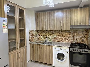 Продажа квартир: 2 комнаты, 50 м², Элитка, 1 этаж — 13