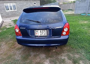 каракол мото: Mazda 323: 2003 г., 1.3 л, Механика, Бензин — 2