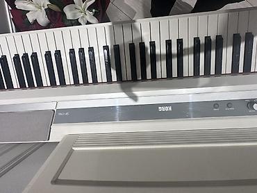 Klavişli alətlər: Korg SP-170S rəng: ağ (kompakt rəqəmsal piano) Xüsusiyyətlər: - 88 — 1