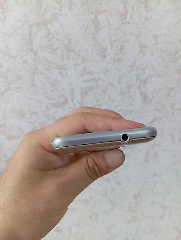 Mobil telefonlar: Samsung Galaxy J1, 4 GB, rəng - Qızılı, Düyməli, Sensor, İki sim kartlı — 4