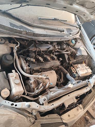 каракол мото: Nissan Primera: 2002 г., 2 л, Механика, Бензин, Хэтчбэк — 8