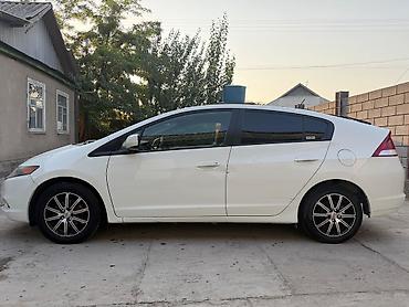 преви: Honda Insight: 2012 г., 1.3 л, Вариатор, Электромобиль — 2