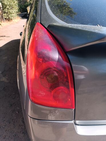 слив сарры: Арткы сол стоп-сигнал Nissan 2001 г., Колдонулган, Оригинал