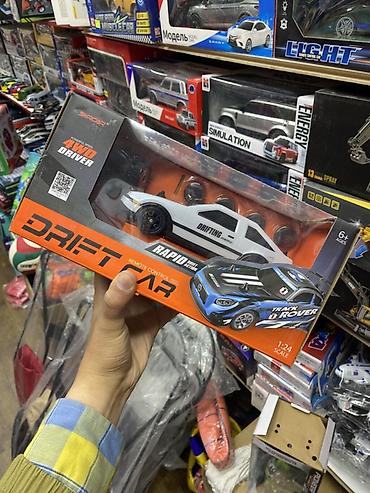 мини дрон: Радиоуправляемая машинка DRIFT CAR в масштабе 1:24. Модель выполнена в — 1