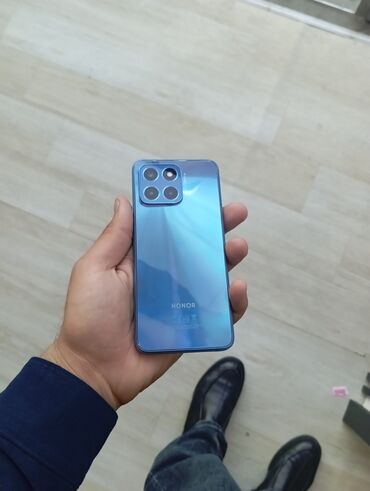 сотовый телефон fly ff249: Honor X6, 64 ГБ, цвет - Синий, Кнопочный, Отпечаток пальца, Две SIM карты