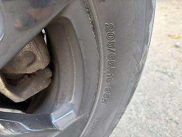 9 0016: Летние шины Bridgestone Turanza T005A, размер 205/65 R16 95H — 3