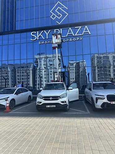 полировк: Автовышка на базе компактного кроссовера — услуги высотных работ — 1