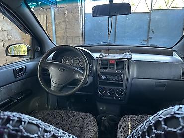 Унаа: Hyundai Getz: 2003 г., 1.4 л, Кол менен иштөөчү, Бензин, Хетчбек — 10