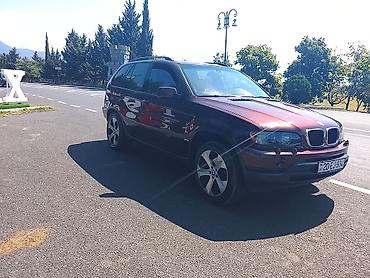 te 28 traktor satisi: BMW X5 (E53), bordoya çalan tünd qırmızı rəngdə SUV. Texniki və — 5