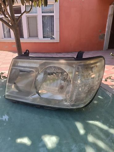 bmw e36 kapot: Toyota Land Cruiser 100 fara ( 2005 ) qabaq ( on ) sag fara original — 1