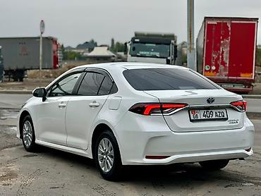 bmw ix3: Toyota Corolla: 2022 г., 1.8 л, Автомат, Гибрид, Седан — 2