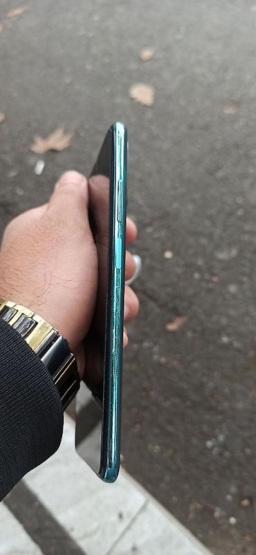 en yaxsi modem hansidir: Xiaomi 128 GB, rəng - Yaşıl, 
 Barmaq izi — 8