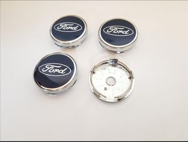 Auto delovi, gume i tjuning: Cepovi za alu felne Ford Precnik celog cepa je: 60mm Cena je za 4