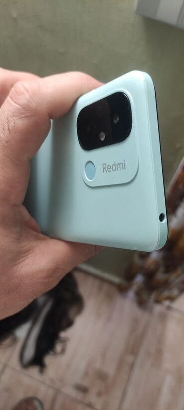 телефон флай еззи 7: Xiaomi Redmi 12C, 64 ГБ, цвет - Голубой, 
 Сенсорный, Отпечаток пальца, Face ID