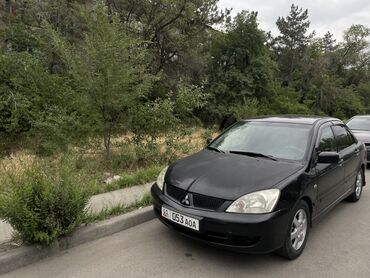 mitsubishi gto: Продается автомобиль Mitsubishi Lancer черного цвета. Есть вложения по