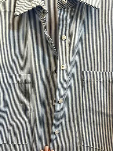 oversize: Mavi çizgili koynek
S-M 
istifade olunmayıb hec, oversizedir — 2