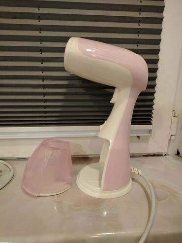 keratin ütüsü: Məhsul: Portativ paltar buxarlandırıcısı (geyim steameri)