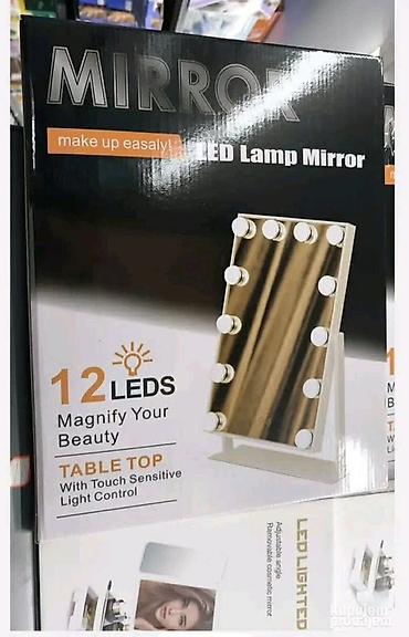 straus trimer: Ovo čvrsto stono ogledalo ima beli metalni okvir, 12 LED svetala sa 3 — 3