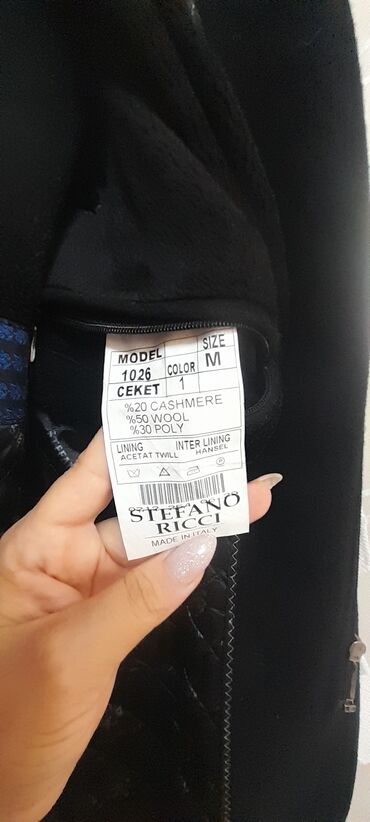 велюровый пальто: Черное мужское пальто от Stefano Ricci с отложным воротником и