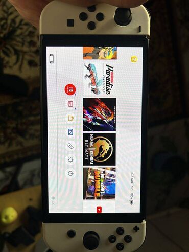 Nintendo switch oled. Konsol ideal veziyyetdedir, hec bir problemi