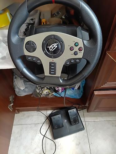 PS3 (Sony PlayStation 3): Oyun sükanı və pedallar dəsti - Markalanması: GS loqolu oyun sükanı - — 1