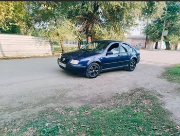 Volkswagen: Volkswagen Bora: 2002 г., 1.4 л, Механика, Бензин, Седан