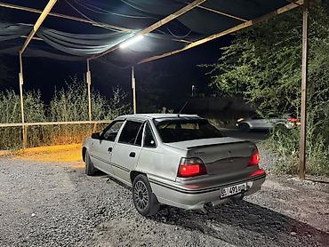 нур мото: Daewoo Nexia: 2008 г., Механика, Бензин, Седан — 1