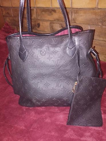Torba nošena par puta Louis Vuitton