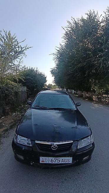 highlander 2: Mazda 626: 2000 г., 1.8 л, Механика, Бензин, Седан — 8