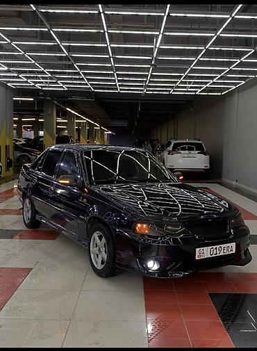 Другие автомобили: Седан черного цвета с доработанным экстерьером. Основные особенности — 1