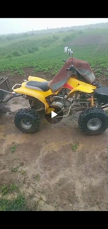qoşqusu olan avtomobil: Sarı rəngli ATV (kvadrosikl) və qoşqu - Güclü benzin mühərriki, hava — 1