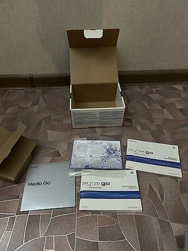 Видеоигры и приставки: Продаю оригинал коробку от psp go на 16 gb в хорошем состоянии — 2