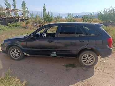 прокладка впускного коллектора: Mazda 323: 2001 г., 1.6 л, Механика, Бензин, Универсал — 3