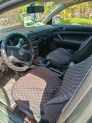 рул: Volkswagen Passat Variant: 2001 г., Кол менен иштөөчү, Универсал — 1