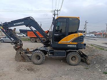 Экскаваторы: Экскаватор, Hyundai, Колесный — 9