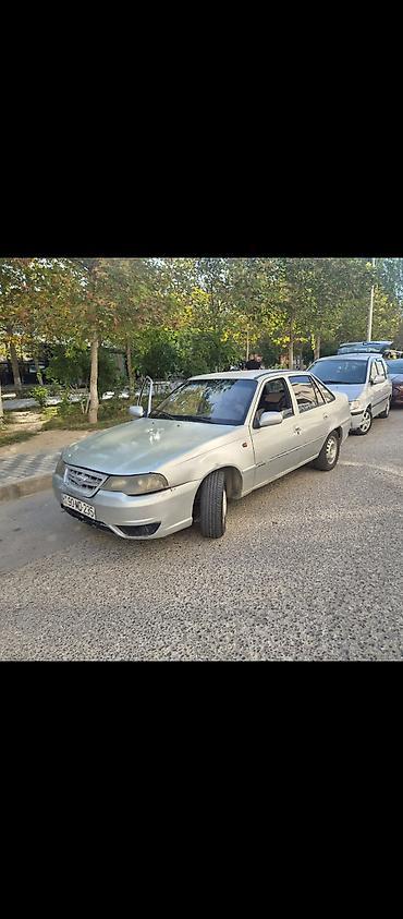 Daewoo: Daewoo Nexia, sedan, gümüşü rəng. - Yanacaq: benzin - Sürətlər qutusu — 3