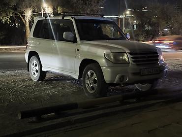 эвакуатор озгон: Mitsubishi Pajero iO: 2003 г., 2 л, Автомат, Бензин, Жол тандабас — 2
